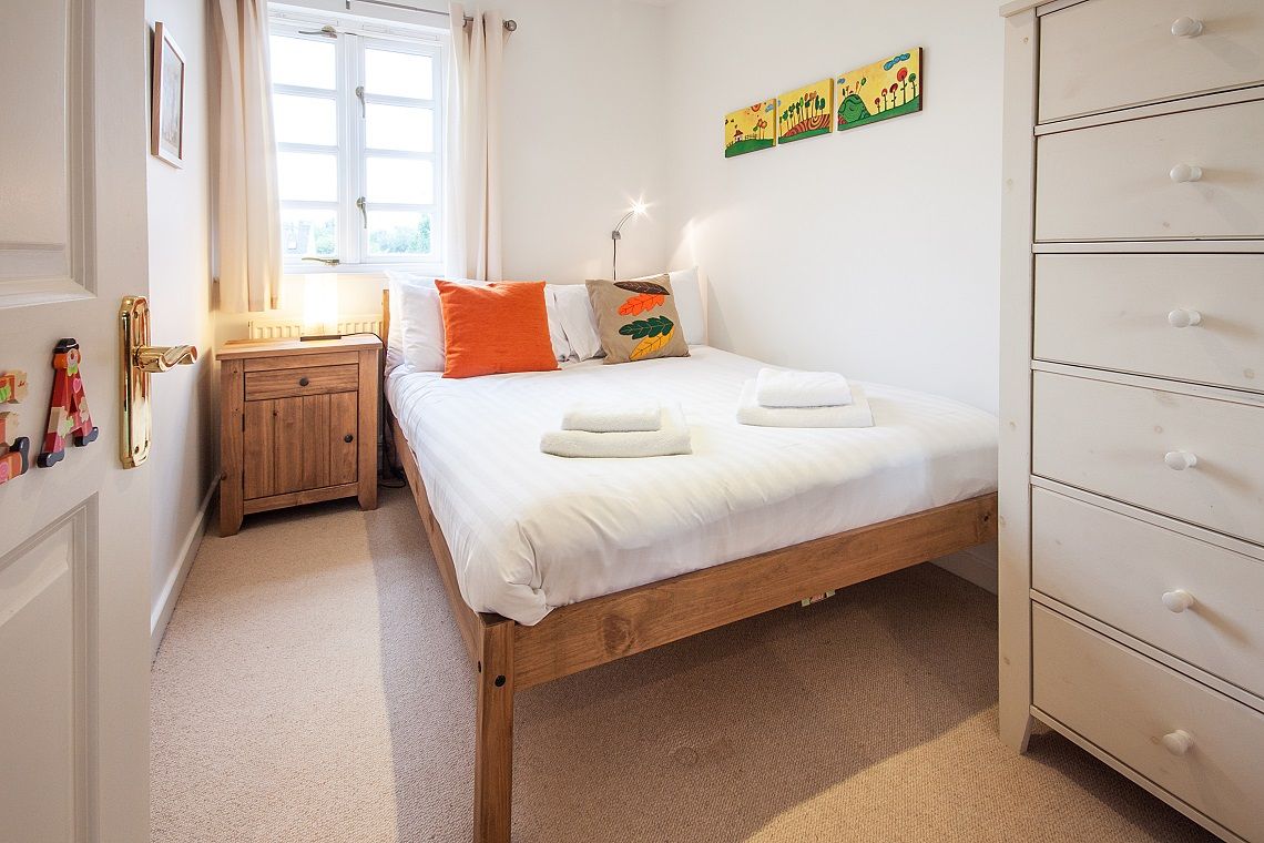 Bedroom 2 with double bed and chest drawers