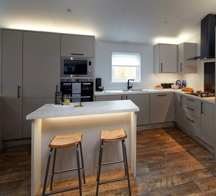 Kitchen with all appliances built in, open plan with lounge and diner