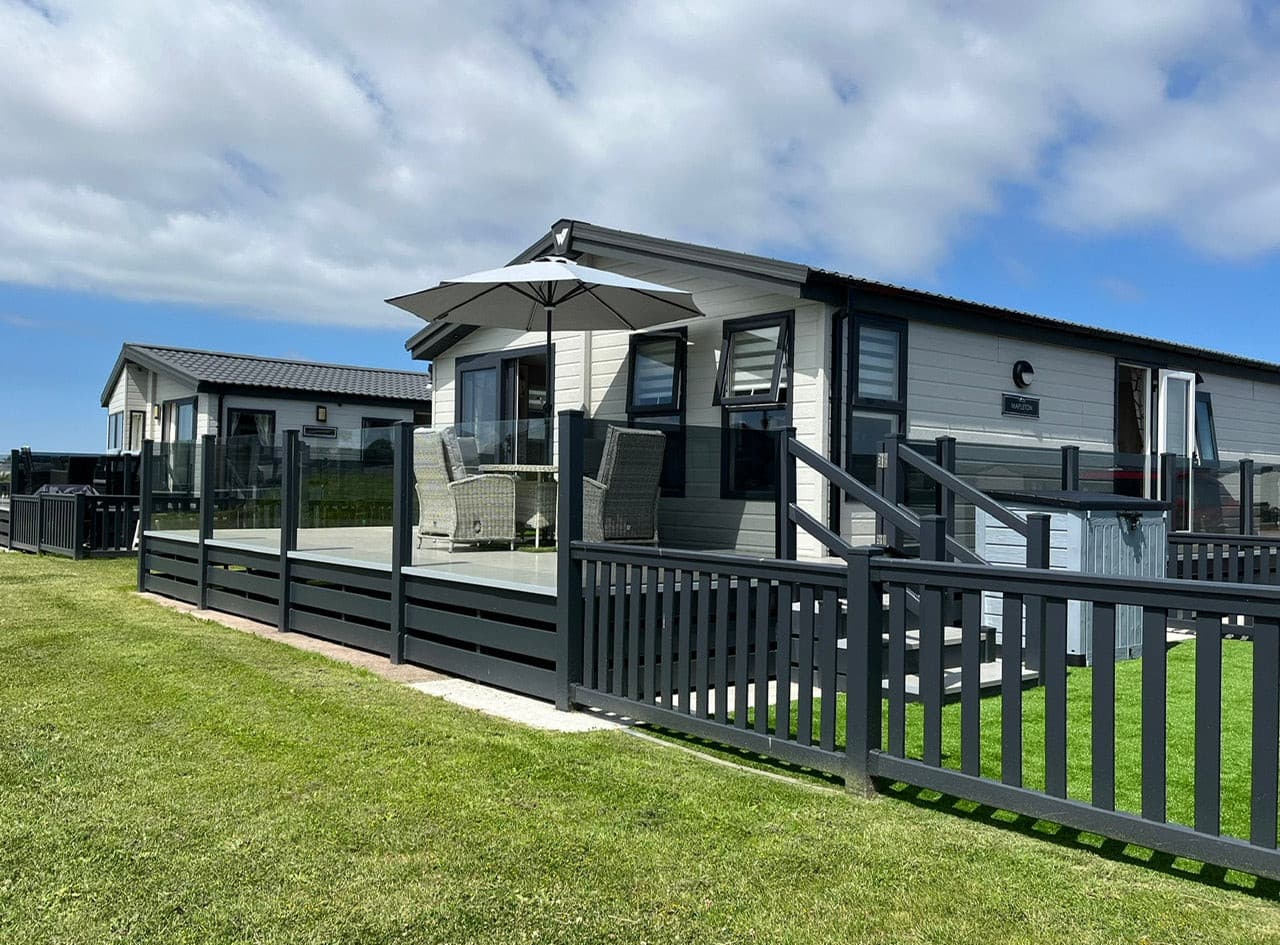Outdoor decking area with table and chairs